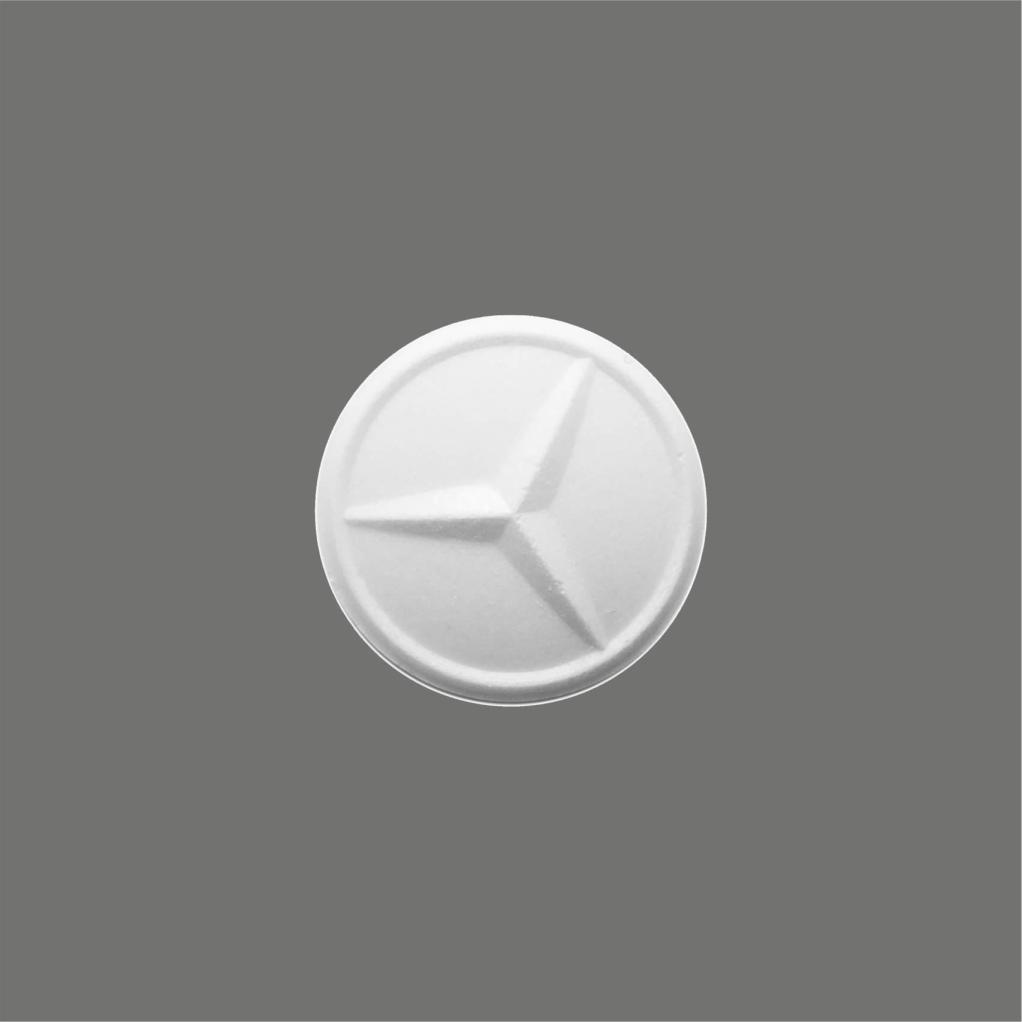 Pfefferminze eigener Form mit Logo-Prägung